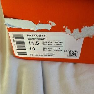 Nike Quest 6 Sneakers in Black and White